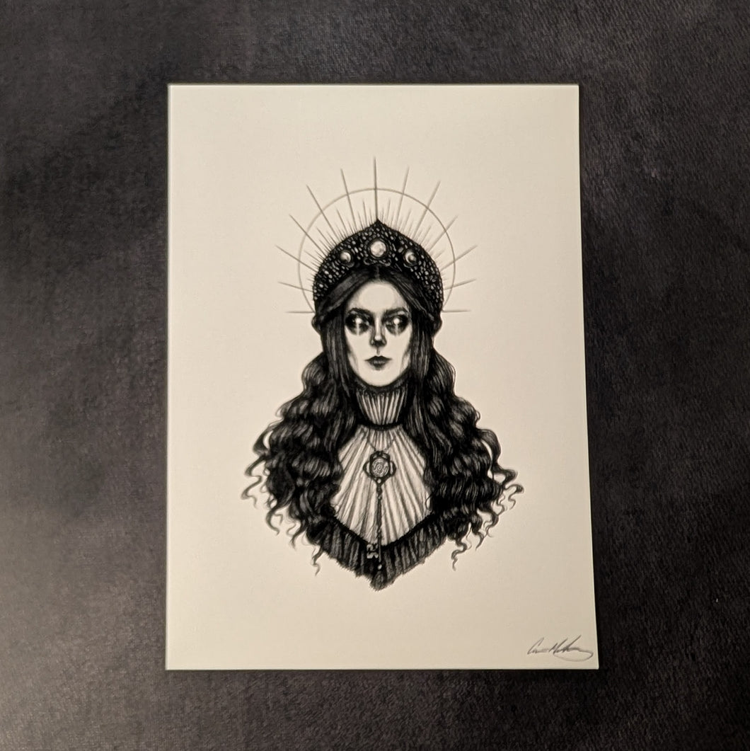 Black drawing on white paper of the Greek Goddess Hecate  from the chest up Her hair is long & wavy & topped with an ornate jeweled crown inlaid with large moonstones & a halo shining behind her head. She sports a key necklace around her neck and a high neck blouse. Available at Coyote Supply Co, a zero waste witch store in Midtown Reno, Nevada that is BIPOC owned